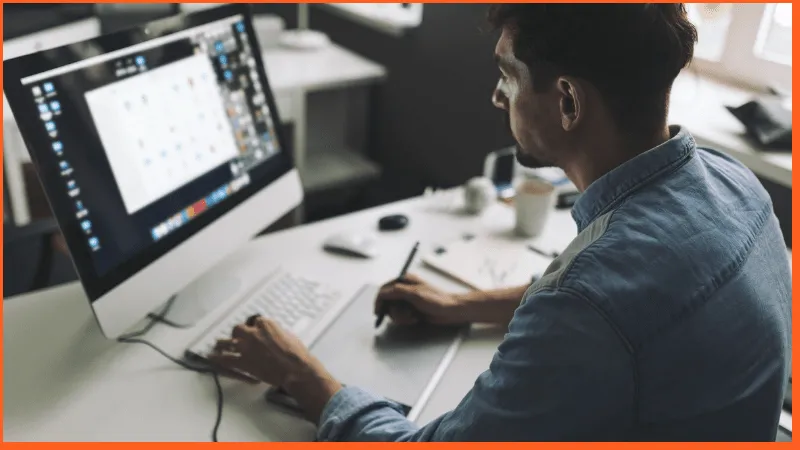 man working on certificate